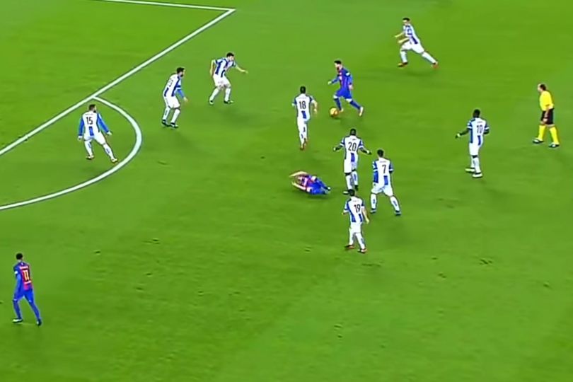 Messi attempting to get past 4 defenders using his dribbling, a basic fundamental football skill